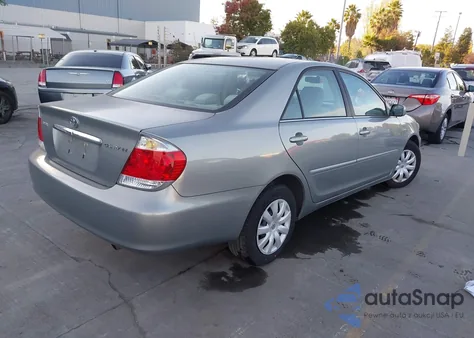 2005 Toyota Camry Le z USA, uszkodzony, nr VIN 4T1BE32K85U565649